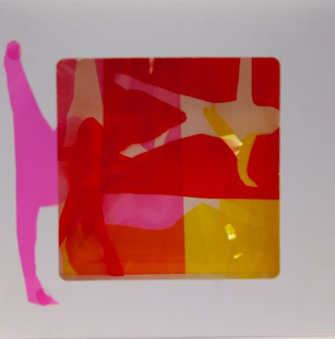 fluorescent light box with neon figurine cutouts  